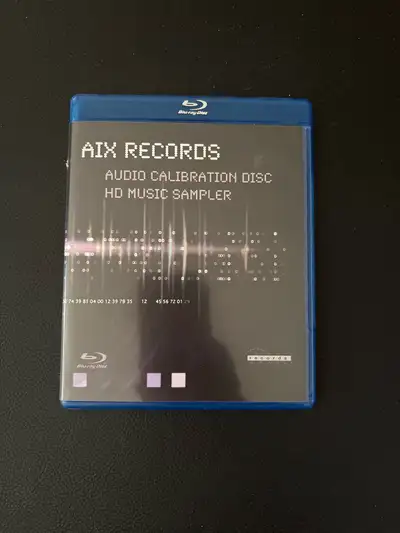 Selling an AIX Records Audio Calibration Disc HD Music Sampler on Blu-ray. This disc is used but is...