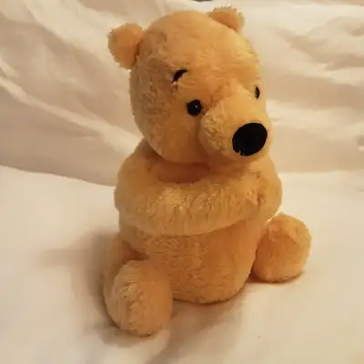 9" high x 6" wide, in seated position. Moving animated head, nods with music, machine works by Welto...