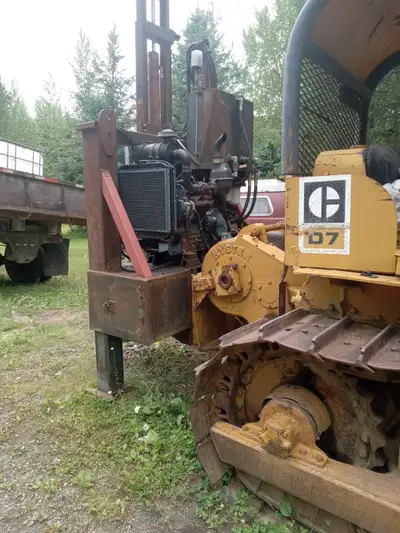 6 inch openflight auger drill,mounted on d7cat.runs great,120 feet of stem,7new bits.450 hrs on dril...