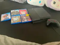 Playstation 4 with controller and 5 GAMES !
