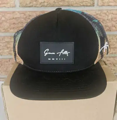 EUC Elevate your headwear collection with the Grace Folly MMVIII Trucker Hat, a versatile and stylis...