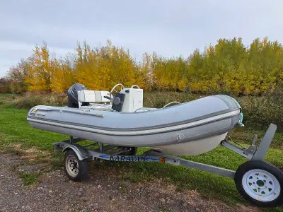 This is a reliable pre-owned Zodiac inflatable boat equipped with a powerful Yamaha four-stroke outb...