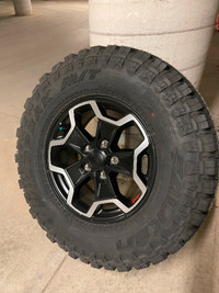 O E.M. Factory jeep, tires, and wheels for sale.