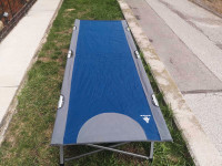 2  Woods brand camp cots for $85  XL size