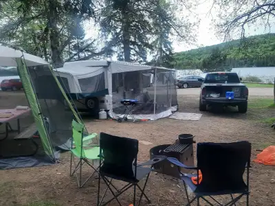 Camper is ready for summer, 19ft pop up barely used, has new bearings sleeps 9, no rips or tears in...