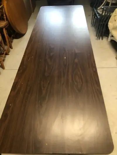 Long 8' Table with fake woodgrain top & folding legs, View more