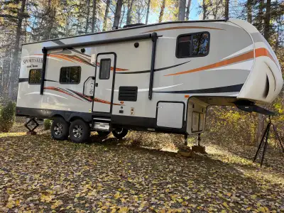 The one and only 2019 - 26 feet 5th wheel toy hauler. We have owned it since new. Sleeps up to 8 adu...