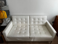 MCM style real leather sofa is in excellent used condition