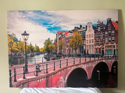This is a high impact, large scale piece that serves as a beautiful focal point in a living room, be...