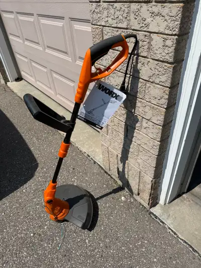 Worx WG119, corded trimmer, View more