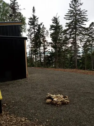 Half acre lot ocean view englishtown Close to baddeck and Sydney No power or septic Outhouse with ho...