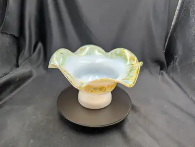 Brighten your vintage collection with this charming Altaglass milk glass bowl with footed base. This...