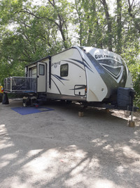Gulf Breeze camper with patio doors to fold down deck