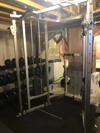 Cable crossover/ functional trainer No attachments included 2X 150lb stacks Close/wide grip pull up...