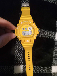 Yellow g-shock watch