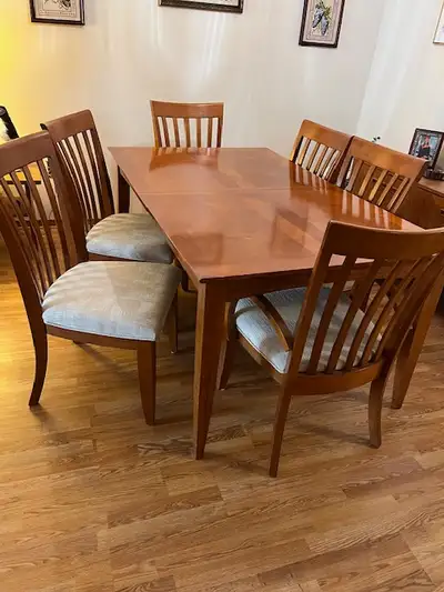 Attractive - Like new table with 6 chairs. Seats 6. There is an extension to the table.