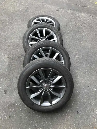 Up for sale my Honda Civic Firestone four all season tires 215/55R16 on Four NEW Honda original fact...