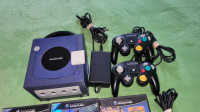GAMECUBE BUNDLE. TOP ROW GAMES ARE IN GOOD CONDITION. 