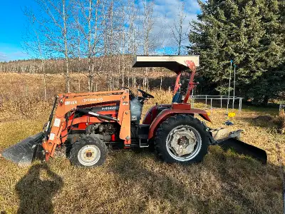Tractor has 131.6 hours logged Too small for our needs Comes with a clam shell bucket Blade on back...