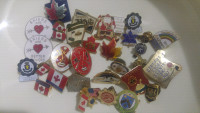 Job lot of collectable lapel pins.