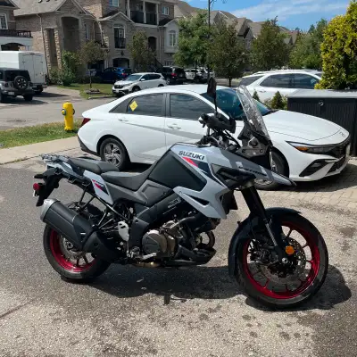 Experience the thrill of discovery with a motorcycle that's barely been broken in! This stunning 202...