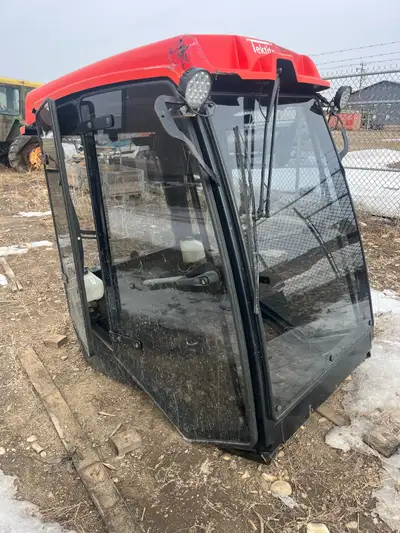 Tektite cab to fit a Kubota F3680. Comes with heater, lights front and rear wiper washers. Some dama...