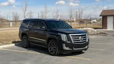 Looking to sell my black on black 2015 Cadillac Escalade Premium. 7 seater with captain chair second...