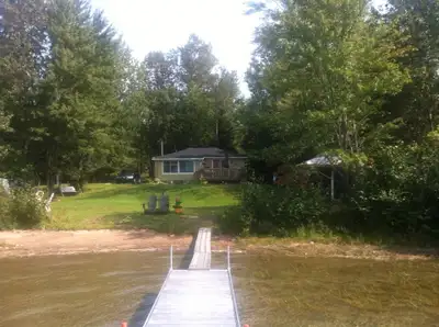 Beautiful cottage for rent on a big lake ( near Gracefield) with sandy shore closed to all amenities...