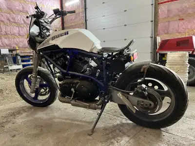 Modified sport bike. 20k, everything works. Hard tail configuration. Have shock, has chain drive in...