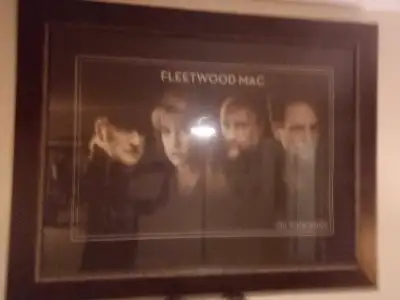 Own a piece of rock history with this framed Fleetwood Mac "Say You Will Tour" poster from 2003. The...