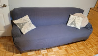 Matching couch and armchair with covers