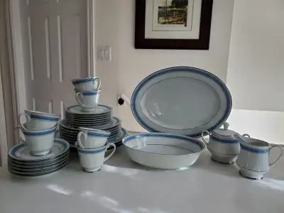 Noritake Pembroke (2892) fine china was produced from 1978 to 1984. Features blue band, line/dots de...