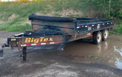 This Big Tex dump trailer is a reliable workhorse, perfect for hauling heavy loads, though it does s...