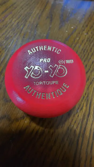 Step back in time with a classic piece of nostalgia, the Vintage Authentic Pro Red Yo-Yo. Crafted fr...