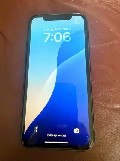 IPhone ll 64GB unlocked , View more
