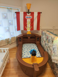 Pirate Toddler Bed $300, Toddler Bed $100.