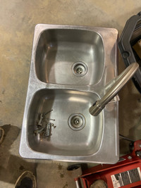 Stainless double sink with tap