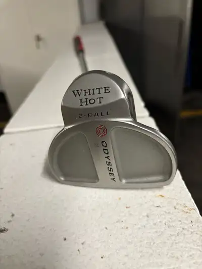 Selling my right-handed Odyssey White Hot 2-Ball putter, complete with a Tiger Shark grip. In very g...
