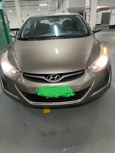 This 2014 Hyundai Elantra is a reliable, fuel-efficient sedan with a smooth ride and low maintenance...