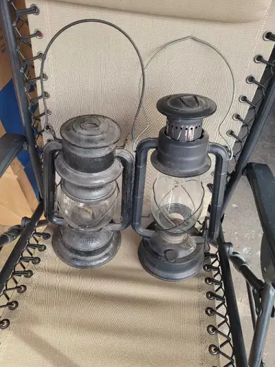 price is $15 each These two vintage, pre-owned kerosene hurricane lanterns offer a classic, rustic c...