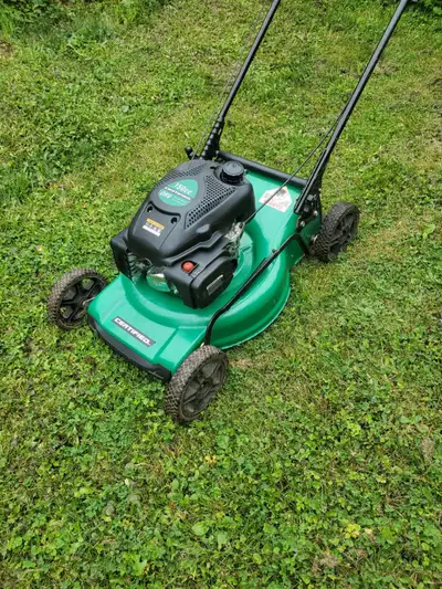 Gas powered lawnmower like new needs nothing $225, View more