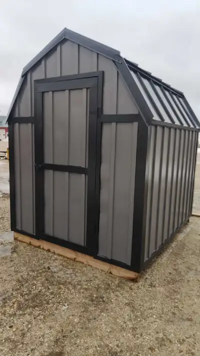7'x8' garden/utility shed for sale. Steel board/ baton style siding, modern style roof. Wood frame....