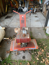 8 hp rototiller. 2speed transmission with reverse.