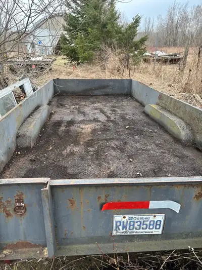 This flatbed trailer is ready for some acreage work! As you can see, it's in 'used' condition, but h...