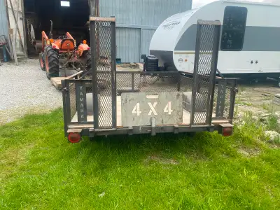 ATV or utility trailer, 12” tires,new deck, always stored inside. Adjustable ramps. Selling as is, u...