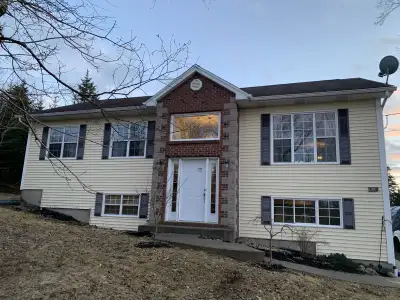 Welcome to this beautiful and spacious split-entry home, perfect for comfortable living! With 4 bedr...