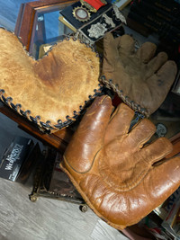 3 antique baseball gloves