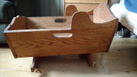 Custom made solid oak baby bassinet