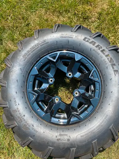 A set of four back tires are 26+9 00R 12 and 26+8 00R 12 Carlisle like brand new rims and tires are...