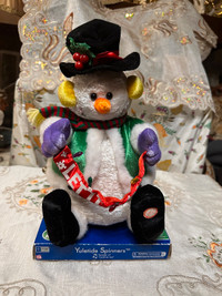 Yuletide Spinners Snowman singing "Cold As Ice".